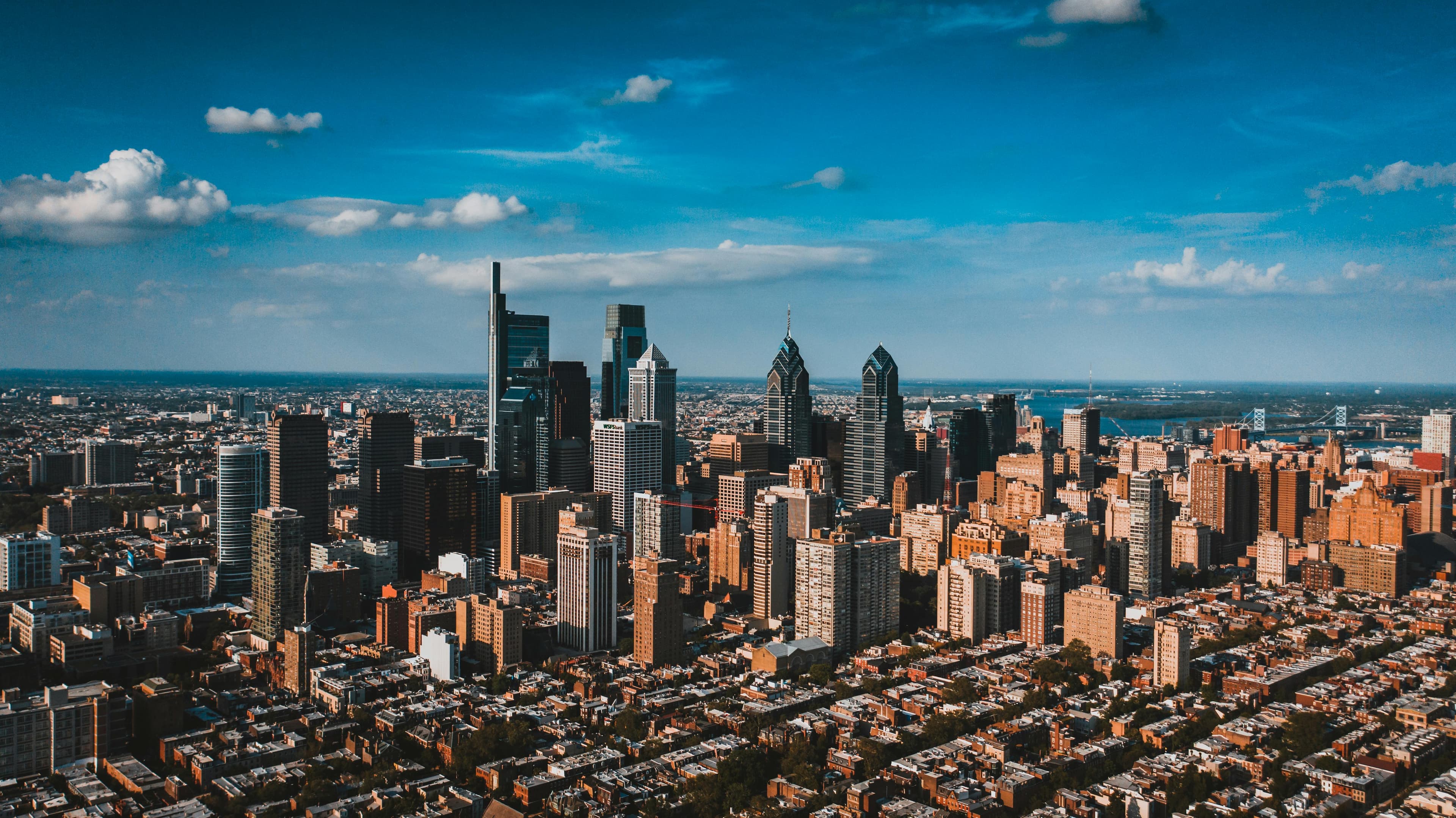 Philadelphia skyline at dusk with city hall and Center City buildings